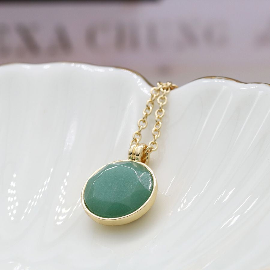 Pom - Golden Necklace with Faceted Green Resin Stone